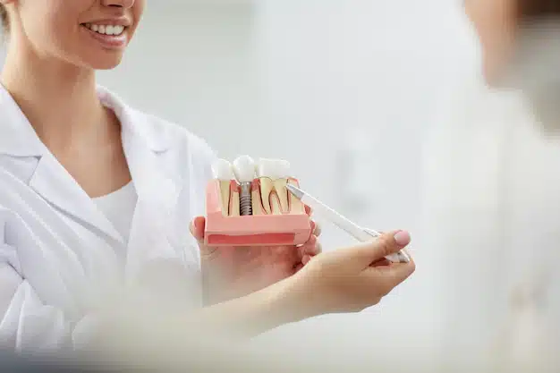 Featured image for “The Definitive Guide To Making Your Dental Implants Last A Lifetime”